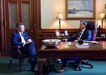 Kevin J. Lilly (left) meets with state Senator Kelly Hancock