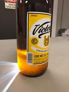 Crystal methamphetamine inside beer bottle